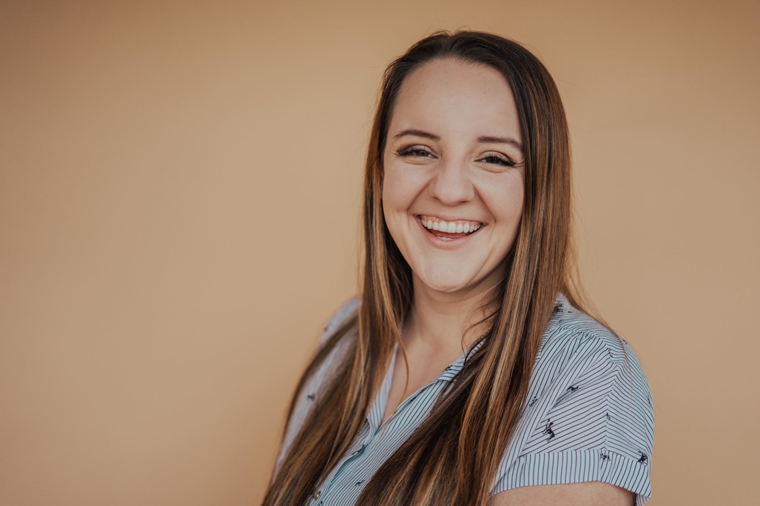virtual assistant for wedding photographers poses for professional headshots